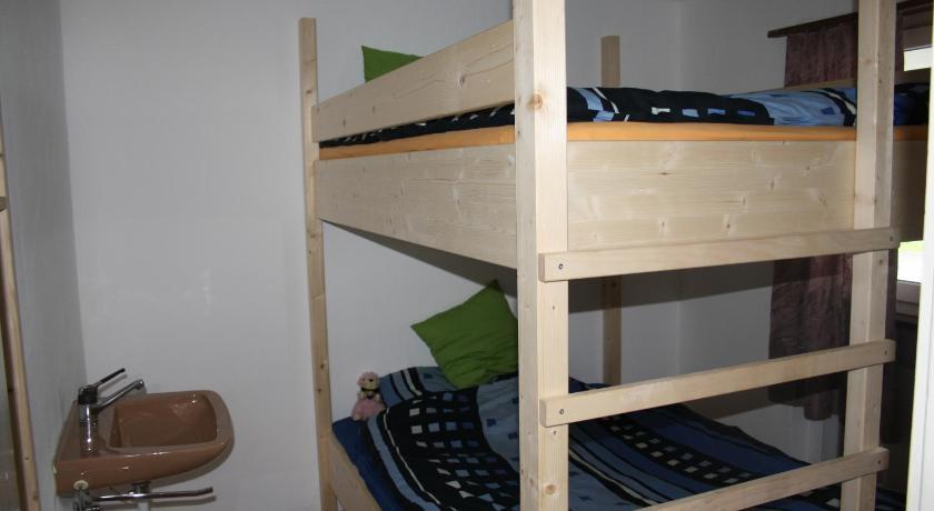 Hostel Sporti Grusch Pokoj fotografie